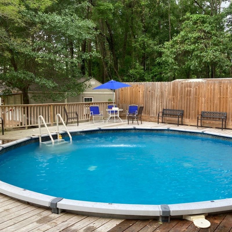 The same above-ground pool with clean blue water