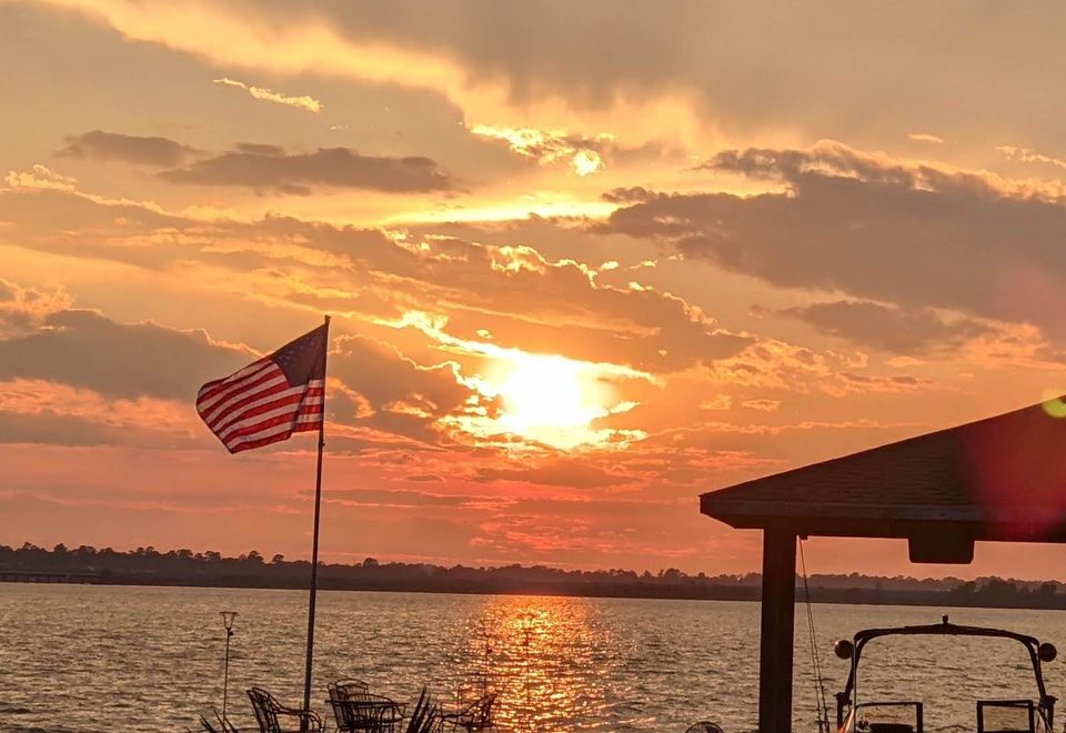 Sunset over Lake Houston seen from a boat dock